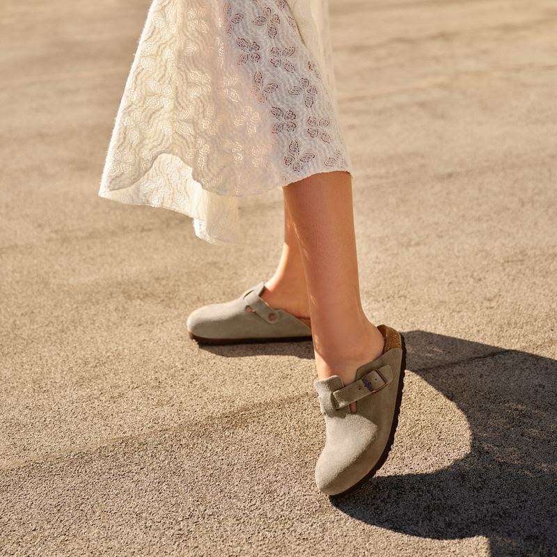Woman with white dress and Birkenstocks