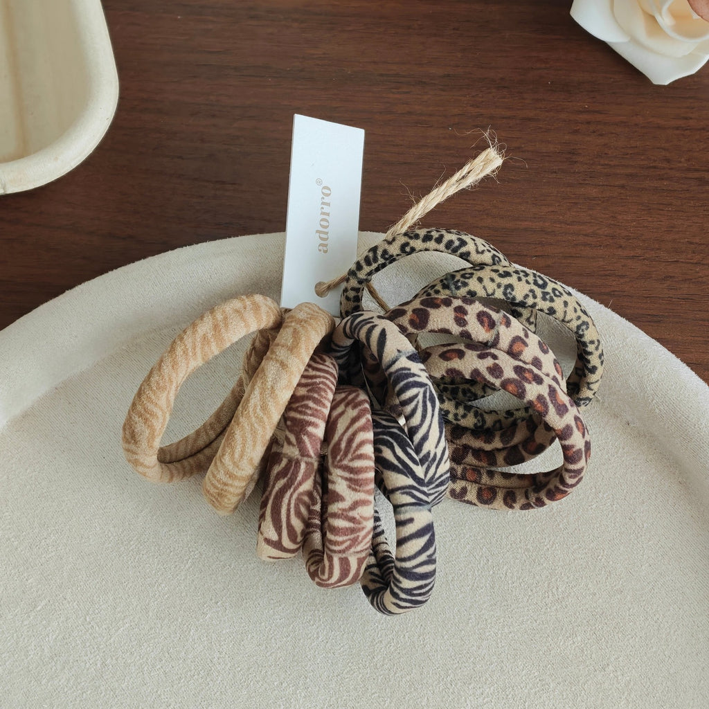 Women's Skinny Seamless Hair Ties (Set of 10) in Animal Print, styled