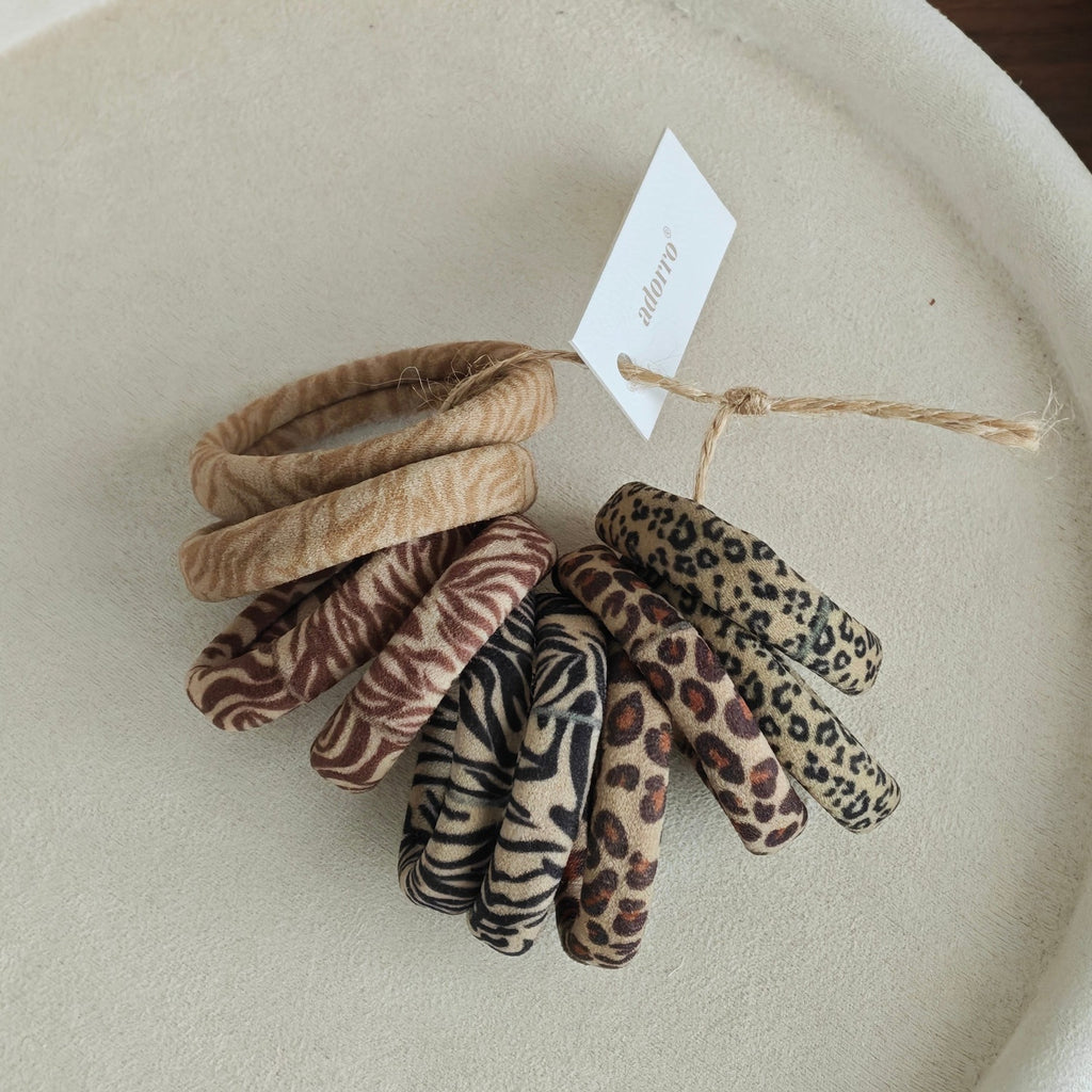 Women's Skinny Seamless Hair Ties (Set of 10) in Animal Print, styled
