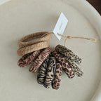 Women's Skinny Seamless Hair Ties (Set of 10) in Animal Print, styled